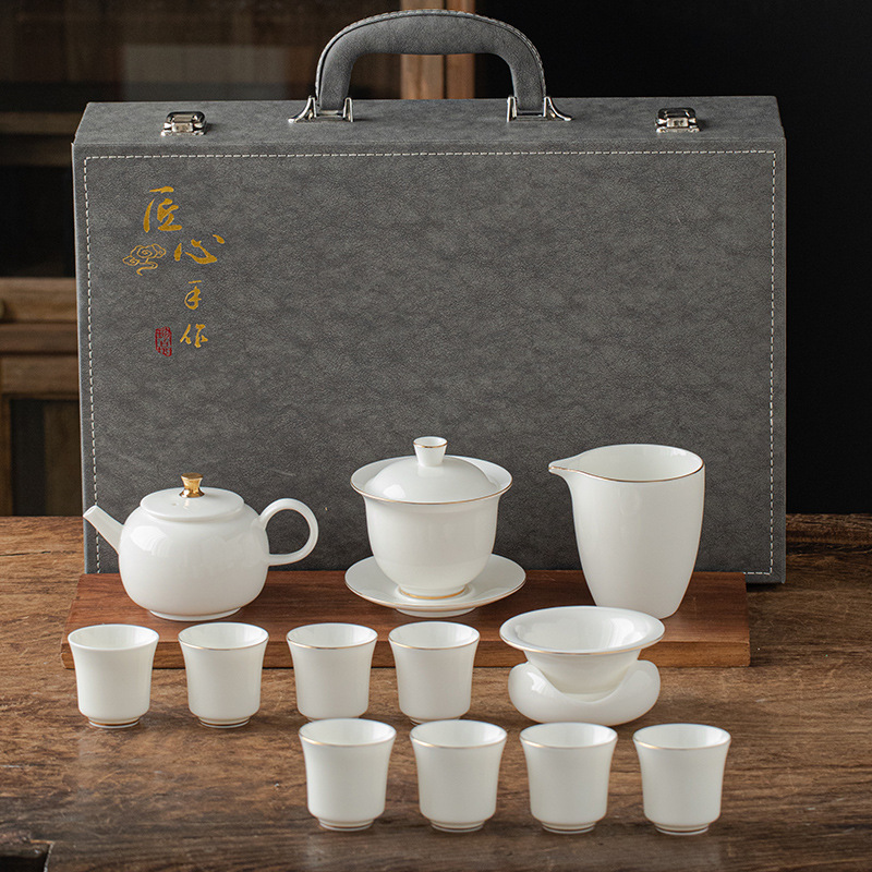 13 piece Dehua Sheep Fat Jade White Porcelain Kung Fu Tea Set Wholesale High end Leather Box Business Gift Teapot Cover Bowl