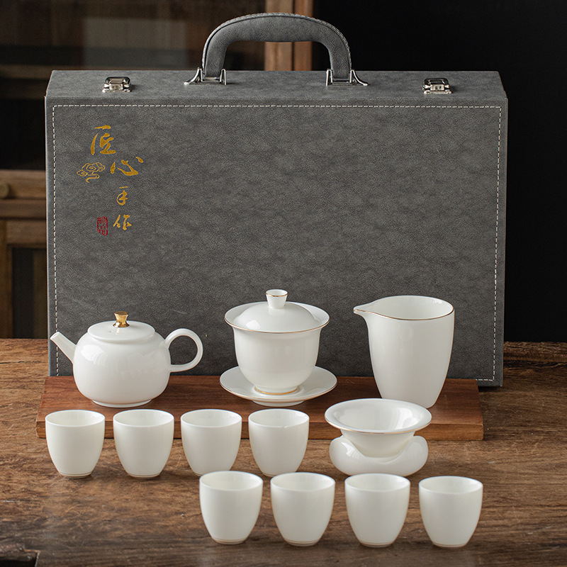 13 piece Dehua Sheep Fat Jade White Porcelain Kung Fu Tea Set Wholesale High end Leather Box Business Gift Teapot Cover Bowl