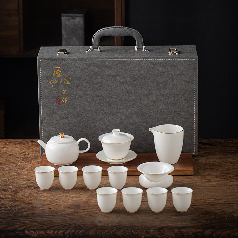 13 piece Dehua Sheep Fat Jade White Porcelain Kung Fu Tea Set Wholesale High end Leather Box Business Gift Teapot Cover Bowl