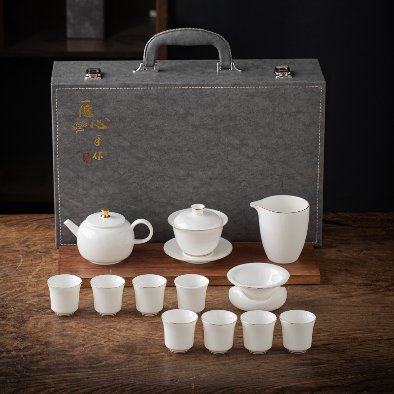 13 piece Dehua Sheep Fat Jade White Porcelain Kung Fu Tea Set Wholesale High end Leather Box Business Gift Teapot Cover Bowl