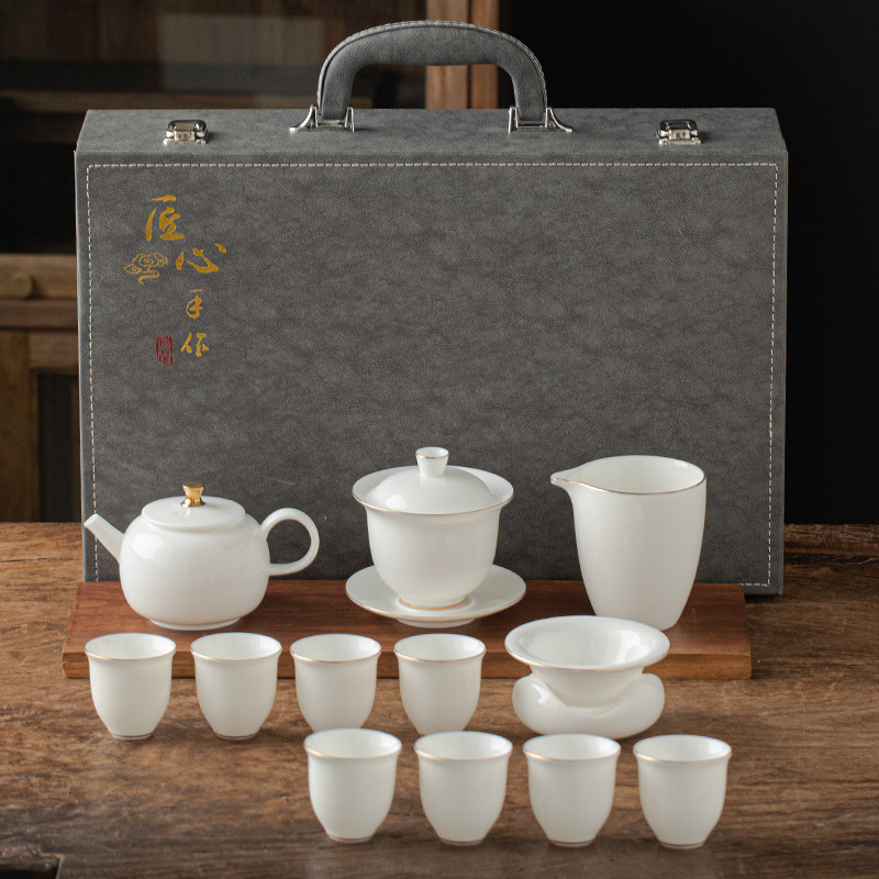 13 piece Dehua Sheep Fat Jade White Porcelain Kung Fu Tea Set Wholesale High end Leather Box Business Gift Teapot Cover Bowl