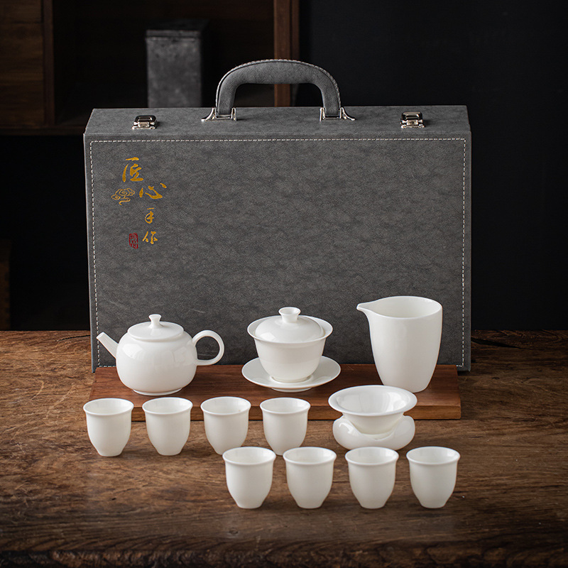 13 piece Dehua Sheep Fat Jade White Porcelain Kung Fu Tea Set Wholesale High end Leather Box Business Gift Teapot Cover Bowl