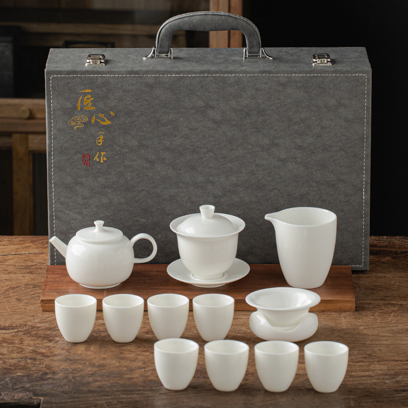 13 piece Dehua Sheep Fat Jade White Porcelain Kung Fu Tea Set Wholesale High end Leather Box Business Gift Teapot Cover Bowl