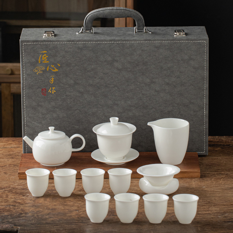 13 piece Dehua Sheep Fat Jade White Porcelain Kung Fu Tea Set Wholesale High end Leather Box Business Gift Teapot Cover Bowl