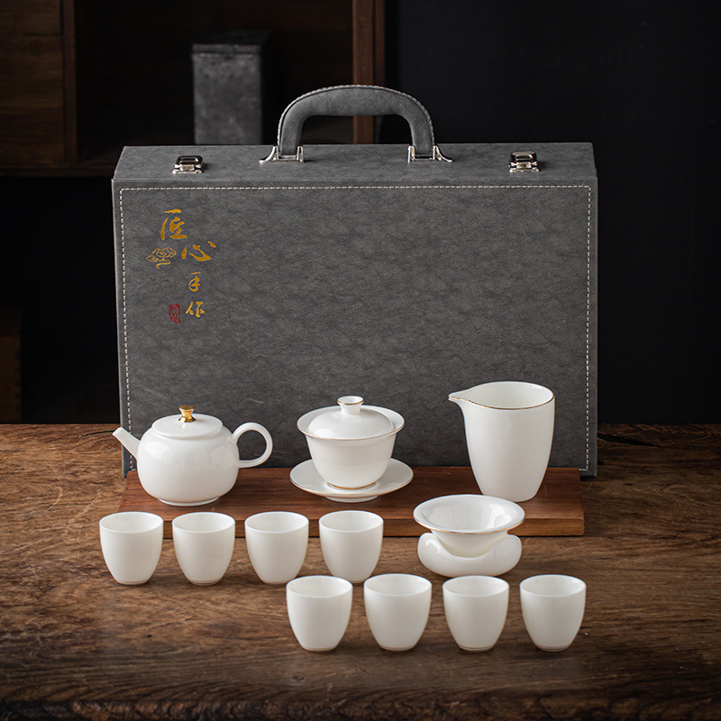 13 piece Dehua Sheep Fat Jade White Porcelain Kung Fu Tea Set Wholesale High end Leather Box Business Gift Teapot Cover Bowl