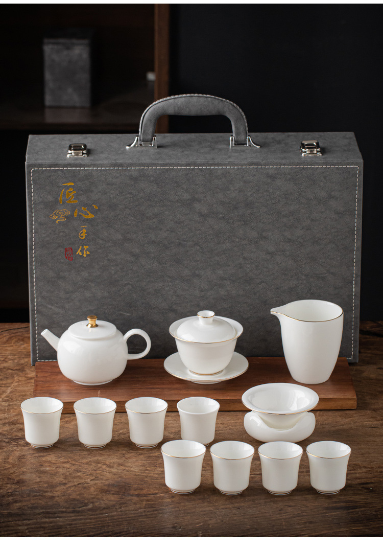 13 piece Dehua Sheep Fat Jade White Porcelain Kung Fu Tea Set Wholesale High end Leather Box Business Gift Teapot Cover Bowl