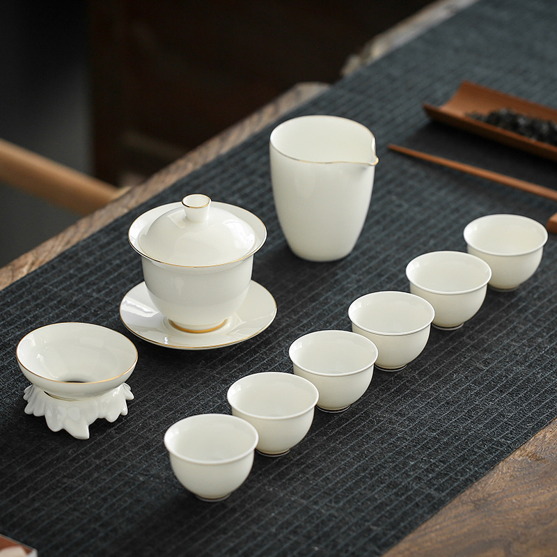 High end Dehua sheep fat jade white porcelain tea set set with gold painted ceramics, three talents bowl covering, Kung Fu tea set wholesale